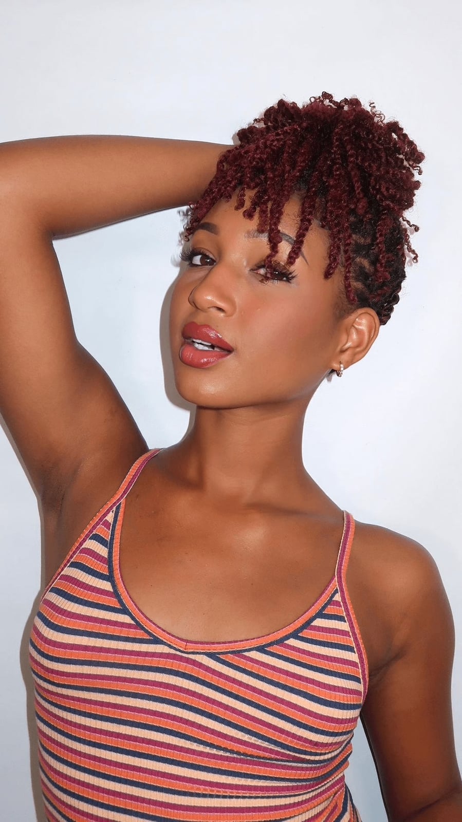Burgundy Coily Updo With Wispy Bangs — Classy Kinky Hair