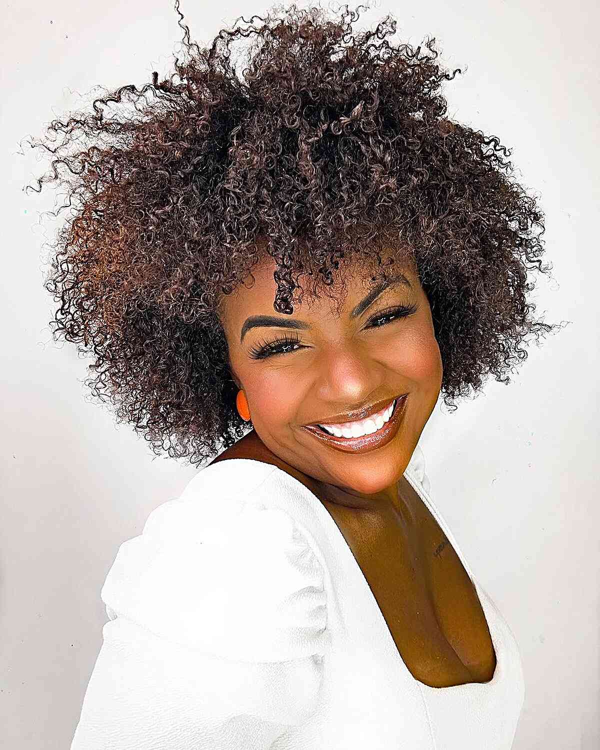 Shoulder Length Coily Blowout With Highlights — Classy Kinky Hair