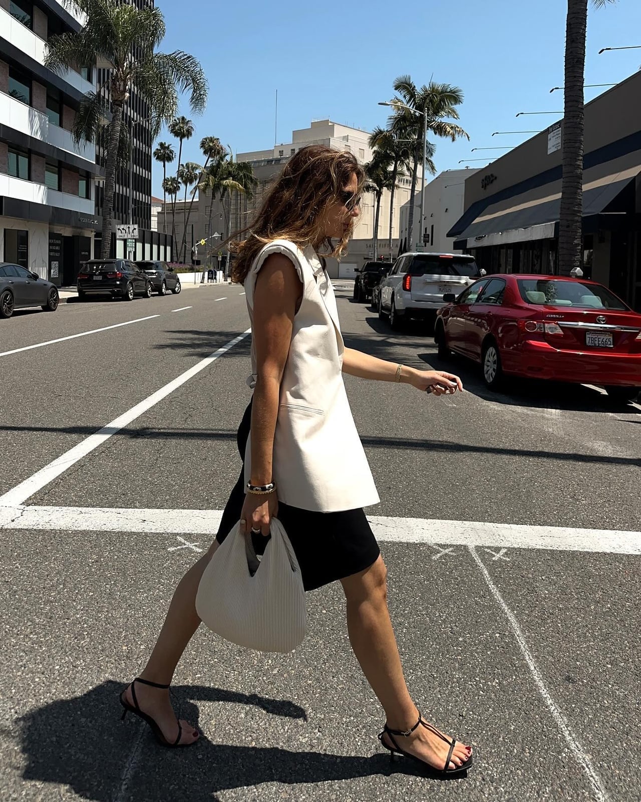 White Sleeveless Vest Over Black Fitted Dress — Classy La Outfits