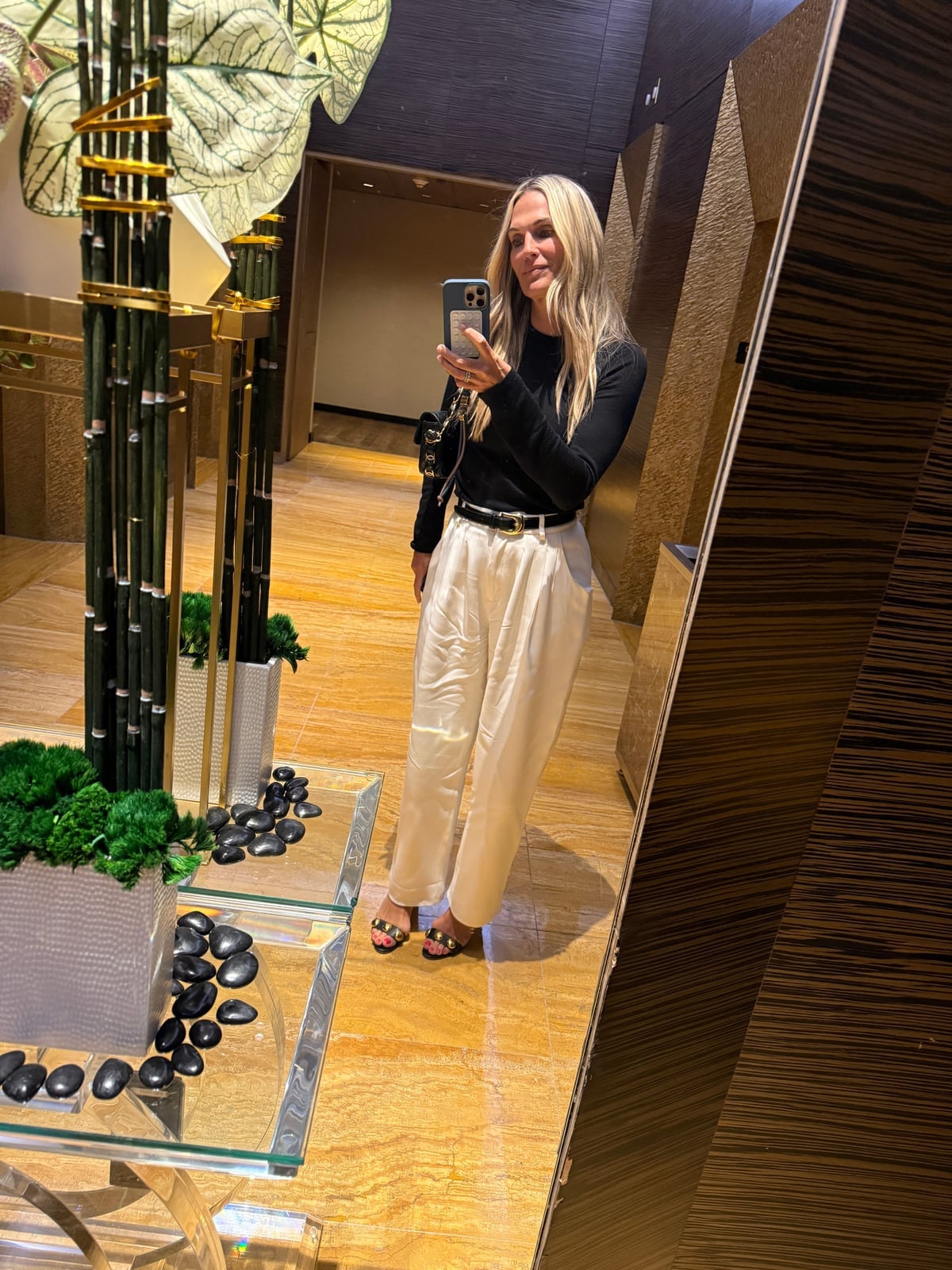 Black Top with Beige Wide-Leg Trousers and Belt Black Top with Beige Wide-Leg Trousers and Belt — Classy Las Vegas Outfits