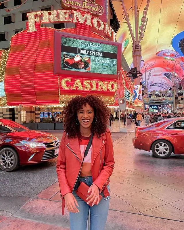 Red Leather Jacket with Cropped Top and Blue Jeans Red Leather Jacket with Cropped Top and Blue Jeans — Classy Las Vegas Outfits