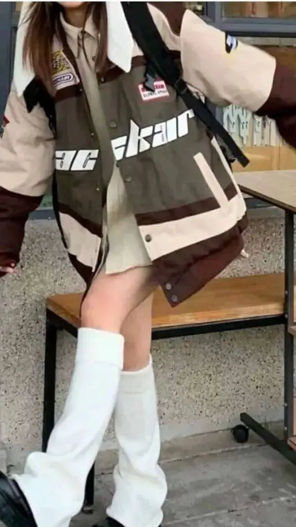 Beige Collared Shirt With Bomber Jacket And White Leg, Close-Up Take Beige Collared Shirt With Bomber Jacket And White Leg, Close-Up Take — Classy Leg Warmers Outfits