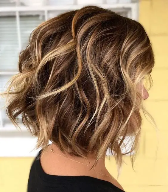 Chin Length Wavy Bob With Balayage — Classy Medium Curly Hair