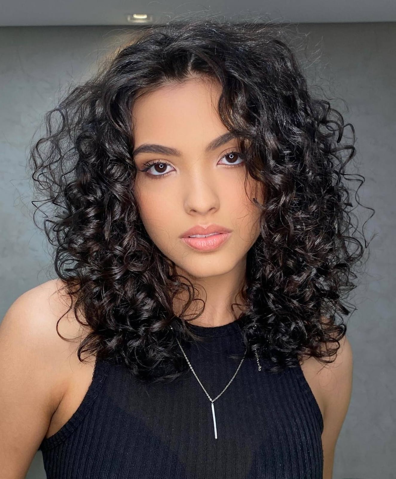 Collarbone Curly Hair With Caramel Highlights — Classy Medium Curly Hair
