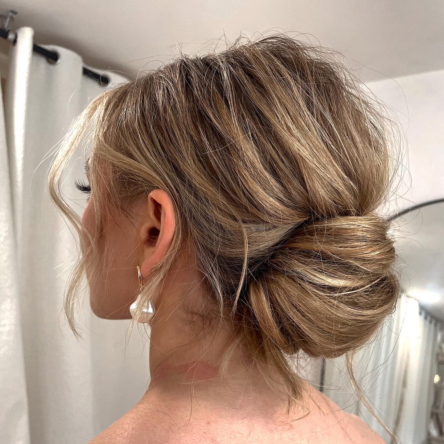 Thick Blonde Collarbone Bun With Loose Strands — Classy Messy Bun Outfit