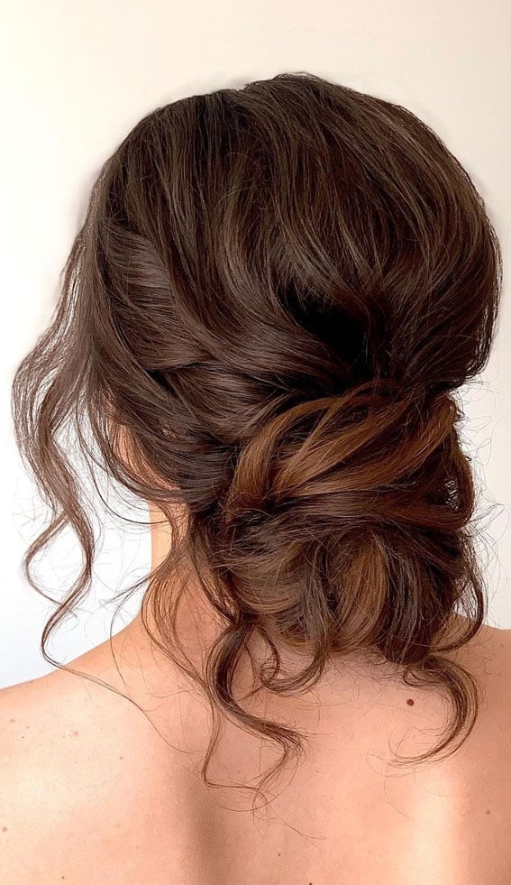 Low Dark Brown Messy Bun With Loose Waves — Classy Messy Bun Outfit