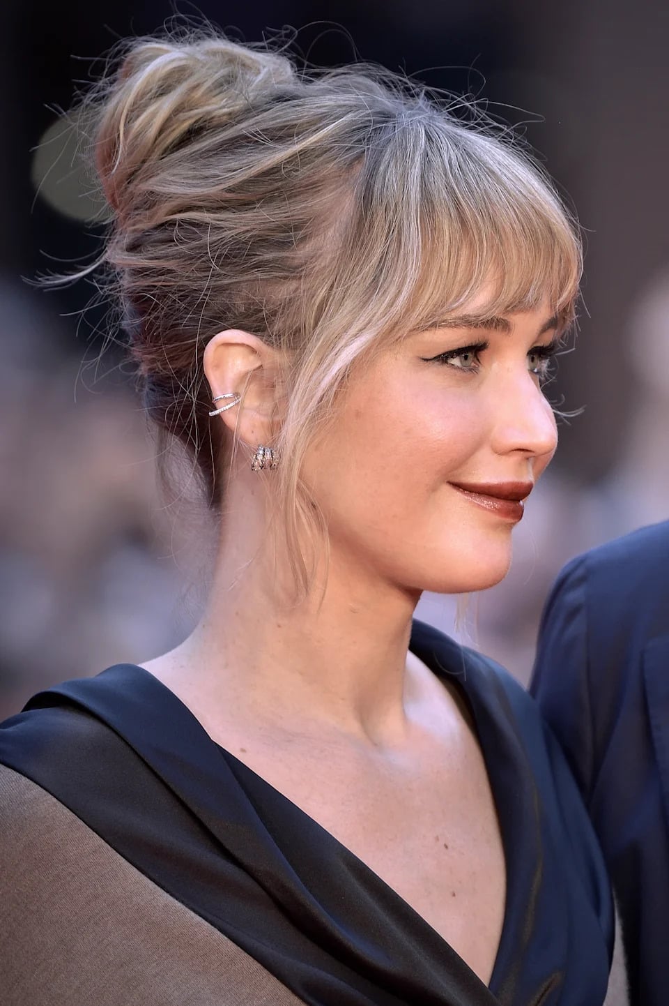 Ash Blonde Messy Bun With Curtain Bangs — Classy Messy Bun Outfit