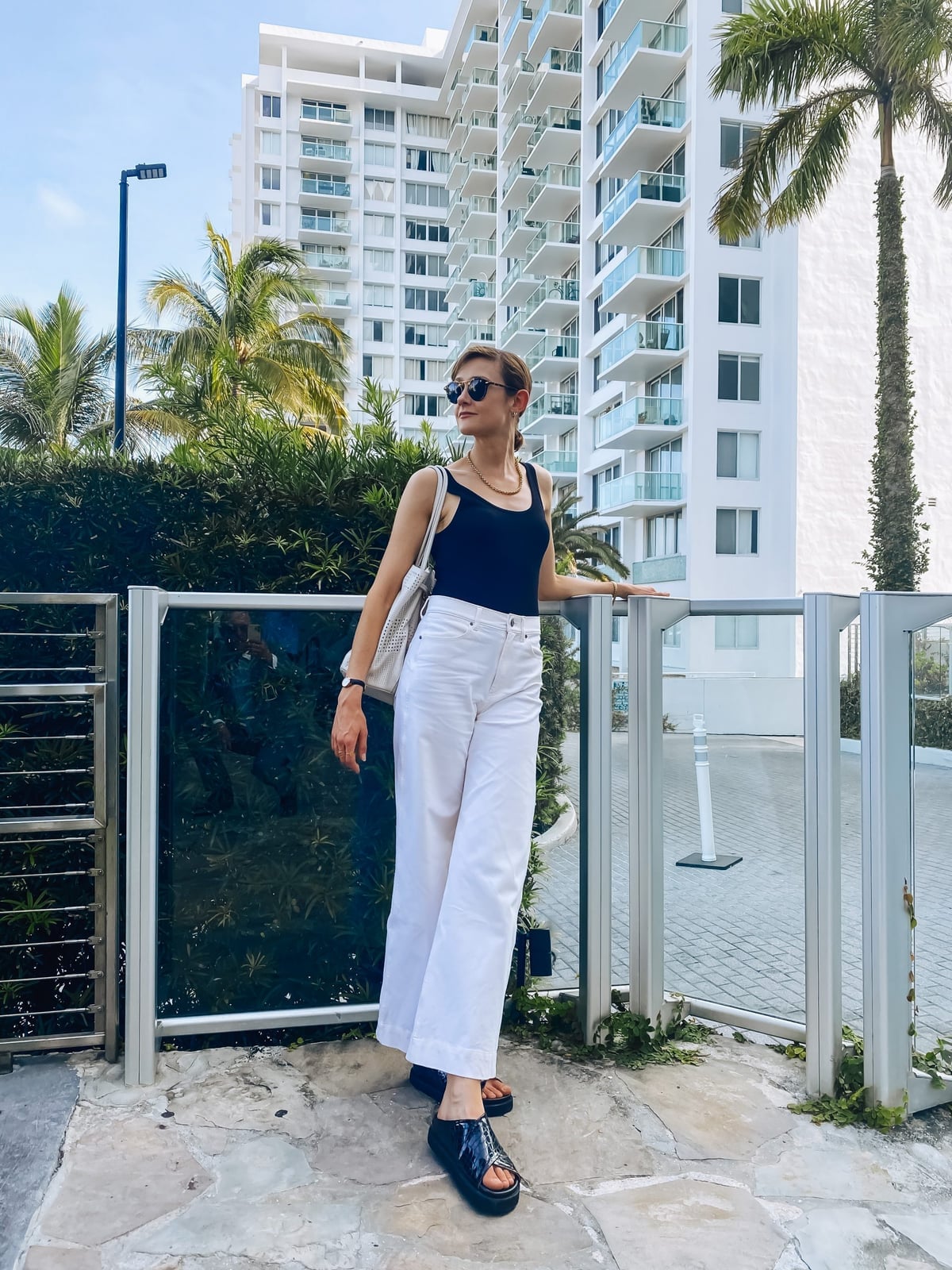 Black Tank Top With Wide-Leg White Jeans Black Tank Top With Wide-Leg White Jeans — Classy Miami Outfits