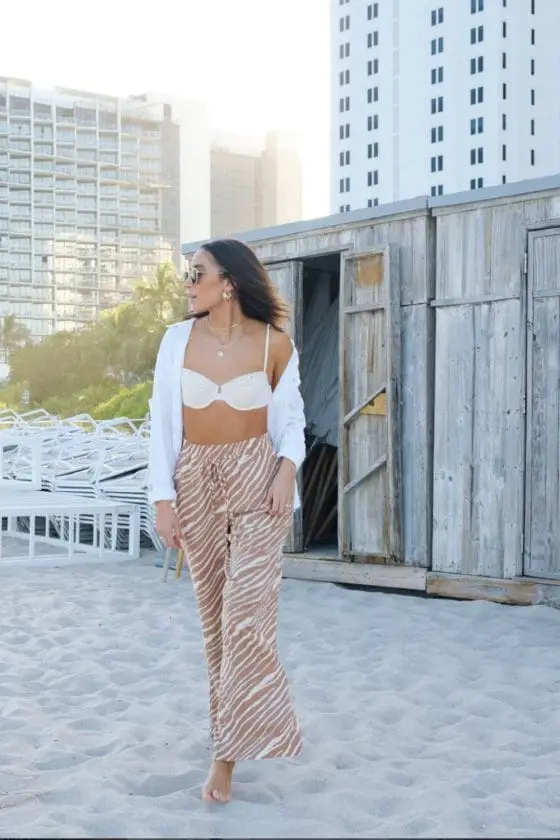 Zebra Print Wide-Leg Trousers With White Bikini Top And Open Shirt Zebra Print Wide-Leg Trousers With White Bikini Top And Open Shirt — Classy Miami Outfits