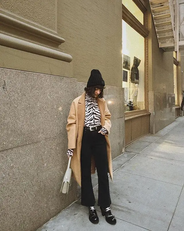 Camel Coat Over Zebra Print Blouse and Wide-Leg Trousers Camel Coat Over Zebra Print Blouse and Wide-Leg Trousers — Classy Modest Outfits