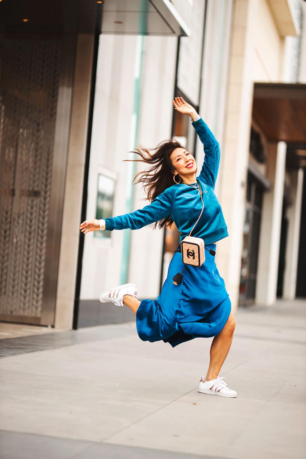 A Teal Satin Midi Skirt Offers a Vibrant Statement — Classy Mom Outfits