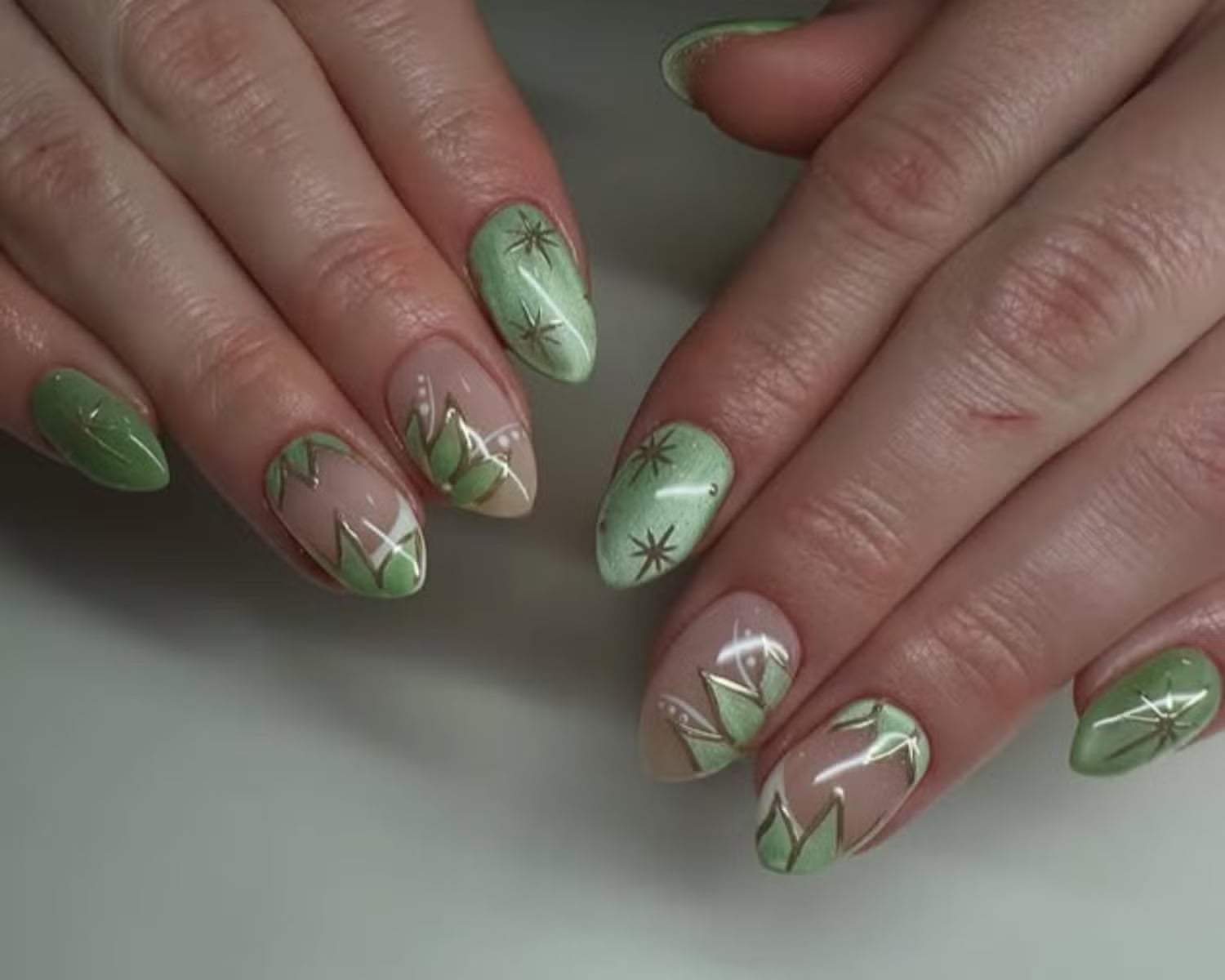 Nude With Light Green Leaves And Gold Stars Nude With Light Green Leaves And Gold Stars — Classy Olive Green Nails