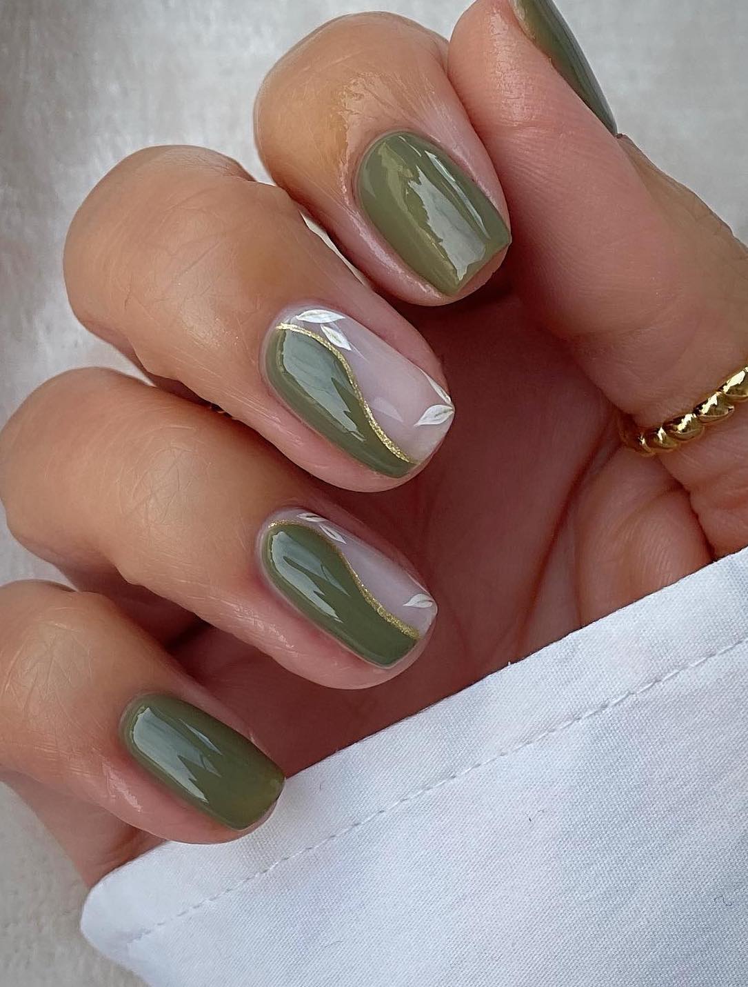 Olive Green With Nude Leaves And Silver Glitter Olive Green With Nude Leaves And Silver Glitter — Classy Olive Green Nails