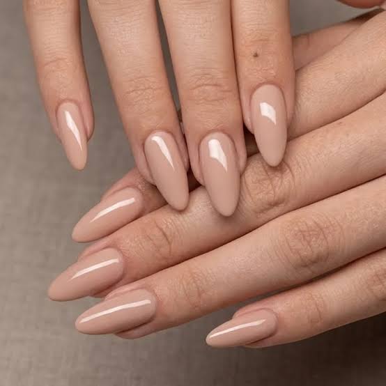 Nude Beige Pink Undertone Medium Almond Glossy Nails, Close-Up Take Nude Beige Pink Undertone Medium Almond Glossy Nails, Close-Up Take — Classy One Color Nails