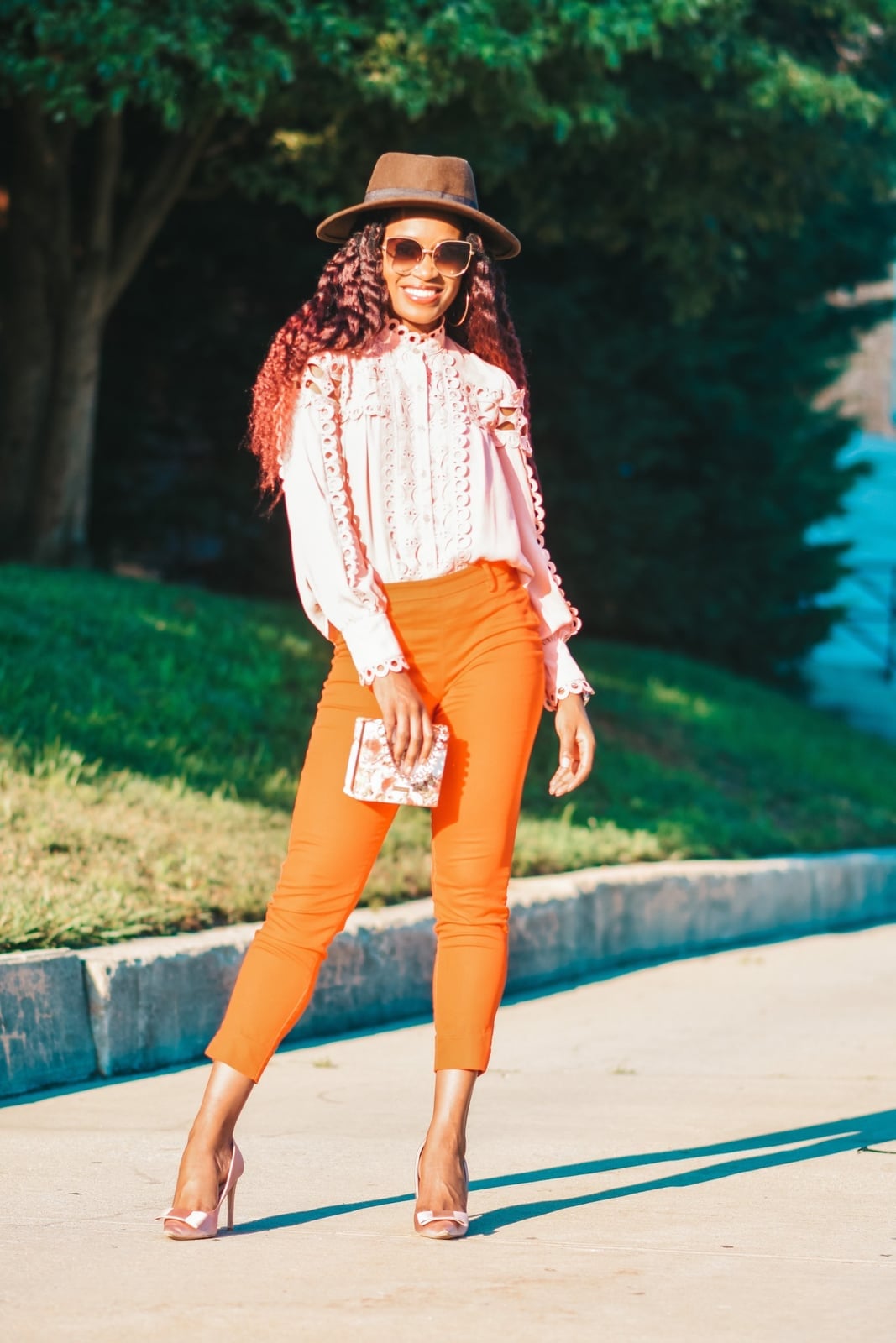Bright Orange Tailored Trousers with Pink Ruffled Blouse — Classy Orange Pants Outfits