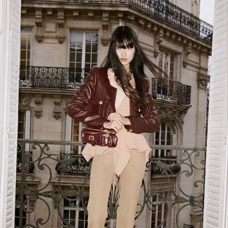Burgundy Leather Jacket with Ruffled Top and Tan Pants Burgundy Leather Jacket with Ruffled Top and Tan Pants — Classy Paris Outfits