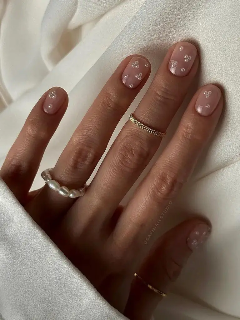 Short Oval Sheer Nude With Scattered Pearls — Classy Pearl Nails