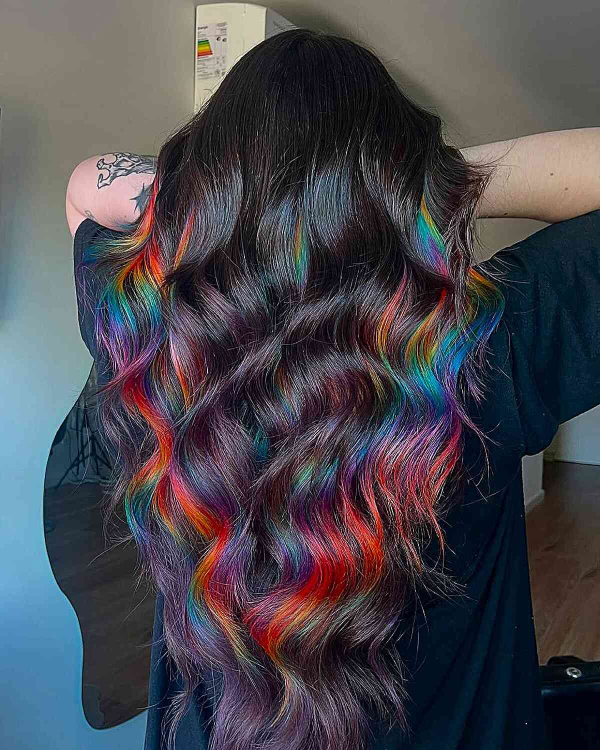 Dark Mid-Back Waves With Holographic Rainbow Highlights — Classy Peekaboo Hair Color