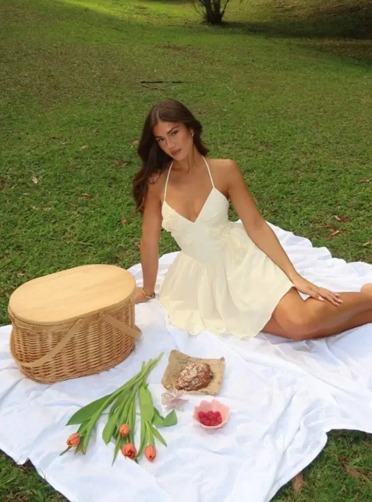 Flowy White Halter Neck Dress with Straw Hat Flowy White Halter Neck Dress with Straw Hat — Classy Picnic Outfit