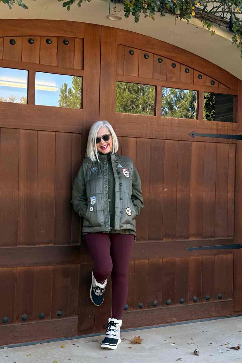 Olive Green Vest Over Burgundy Mock Neck Top — Classy Pilates Outfits