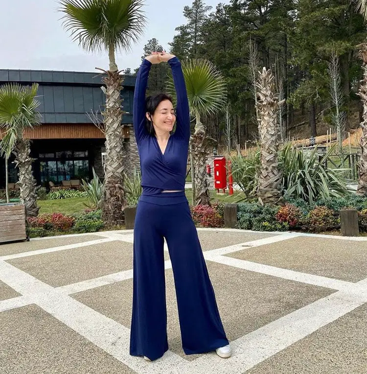 Navy Blue Wrap Top With Palazzo Pants — Classy Pilates Outfits
