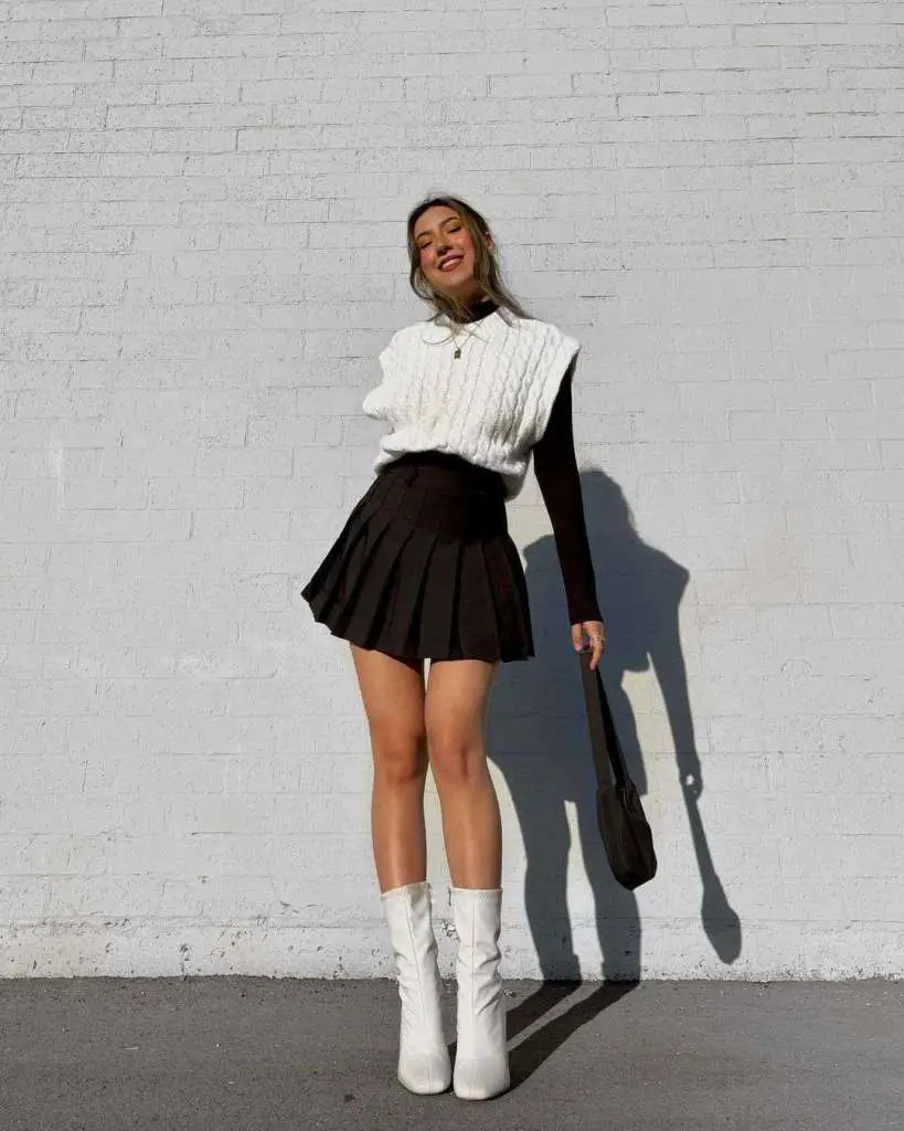 Cable-Knit Vest Over Long-Sleeve Top With Mini Skirt Cable-Knit Vest Over Long-Sleeve Top With Mini Skirt — Classy Preppy Outfits