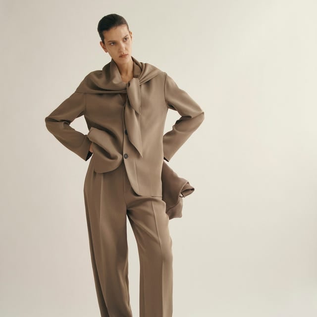 Oversized Taupe Suit with Wide-Leg Trousers and Scarf Detail Oversized Taupe Suit with Wide-Leg Trousers and Scarf Detail — Classy Professional Outfits