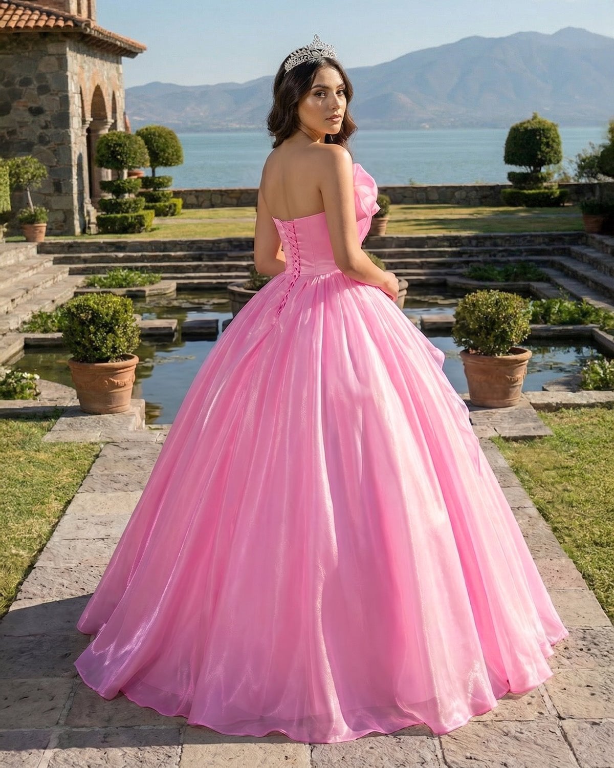 Bright Pink Strapless Organza Ballgown With The Model Wears A Tiara Bright Pink Strapless Organza Ballgown With The Model Wears A Tiara — Classy Quince Dress