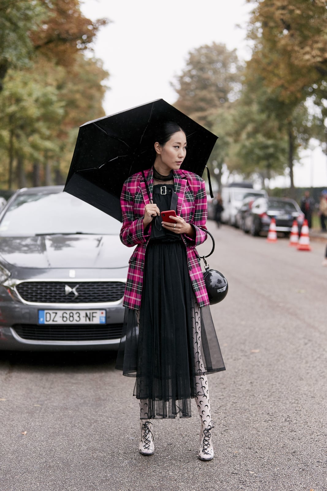 Plaid Jacket Over Black Dress With Sheer Skirt And Lace-Up Shoes Plaid Jacket Over Black Dress With Sheer Skirt And Lace-Up Shoes — Classy Rainy Day Outfits