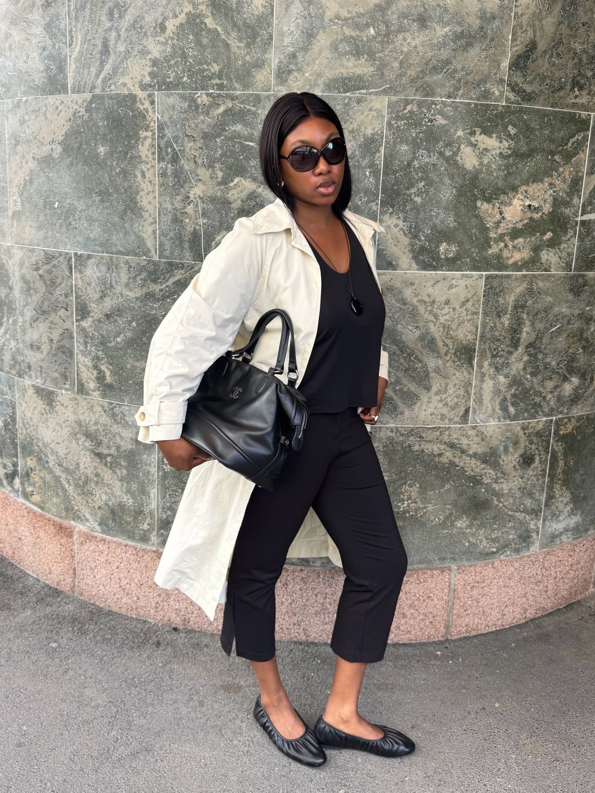 Cream Trench Coat Over Black Tank Top And Cropped Trousers Cream Trench Coat Over Black Tank Top And Cropped Trousers — Classy Rainy Day Outfits