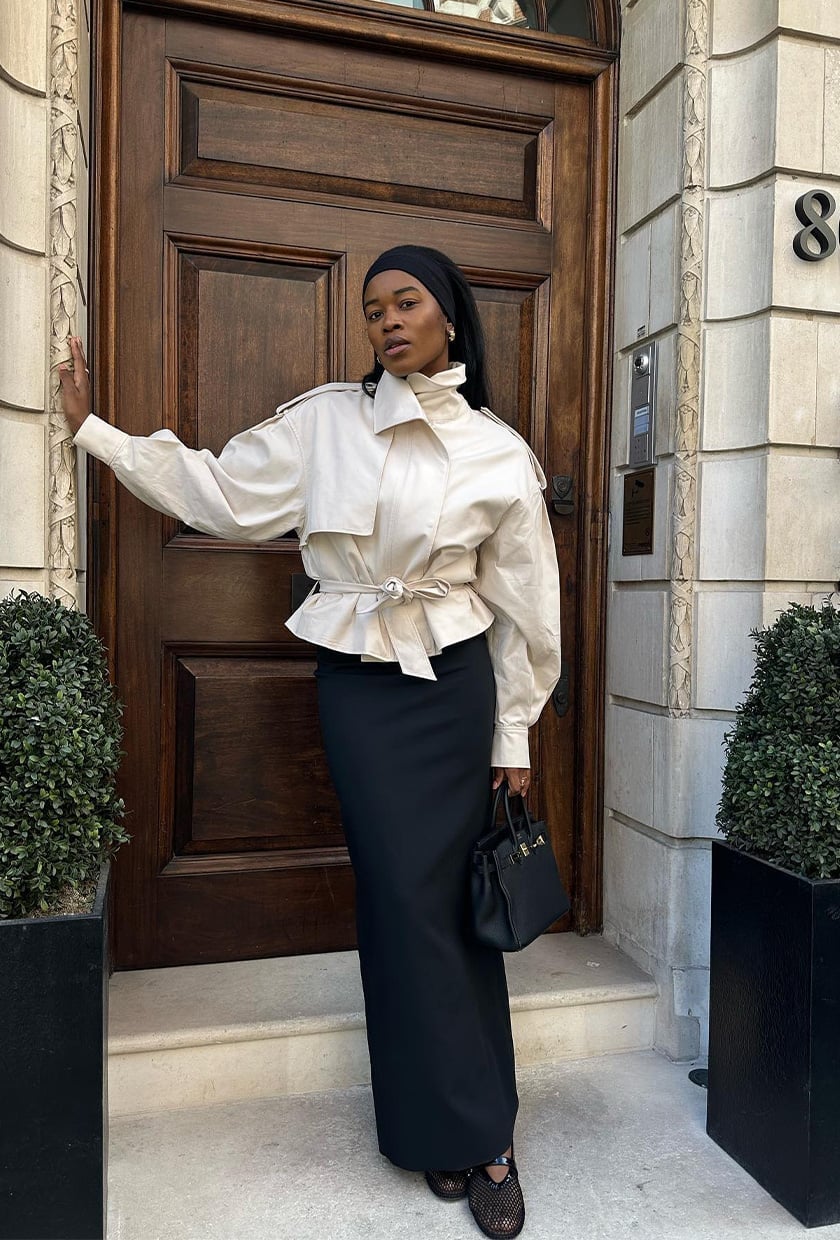 White Belted Jacket With Long Black Skirt And Mesh Flats White Belted Jacket With Long Black Skirt And Mesh Flats — Classy Rainy Day Outfits