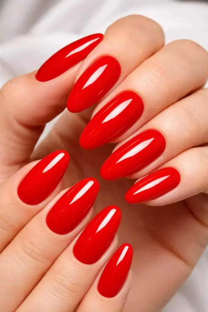 Bright Glossy Red Medium Almond Nails Bright Glossy Red Medium Almond Nails — Classy Red Almond Nails