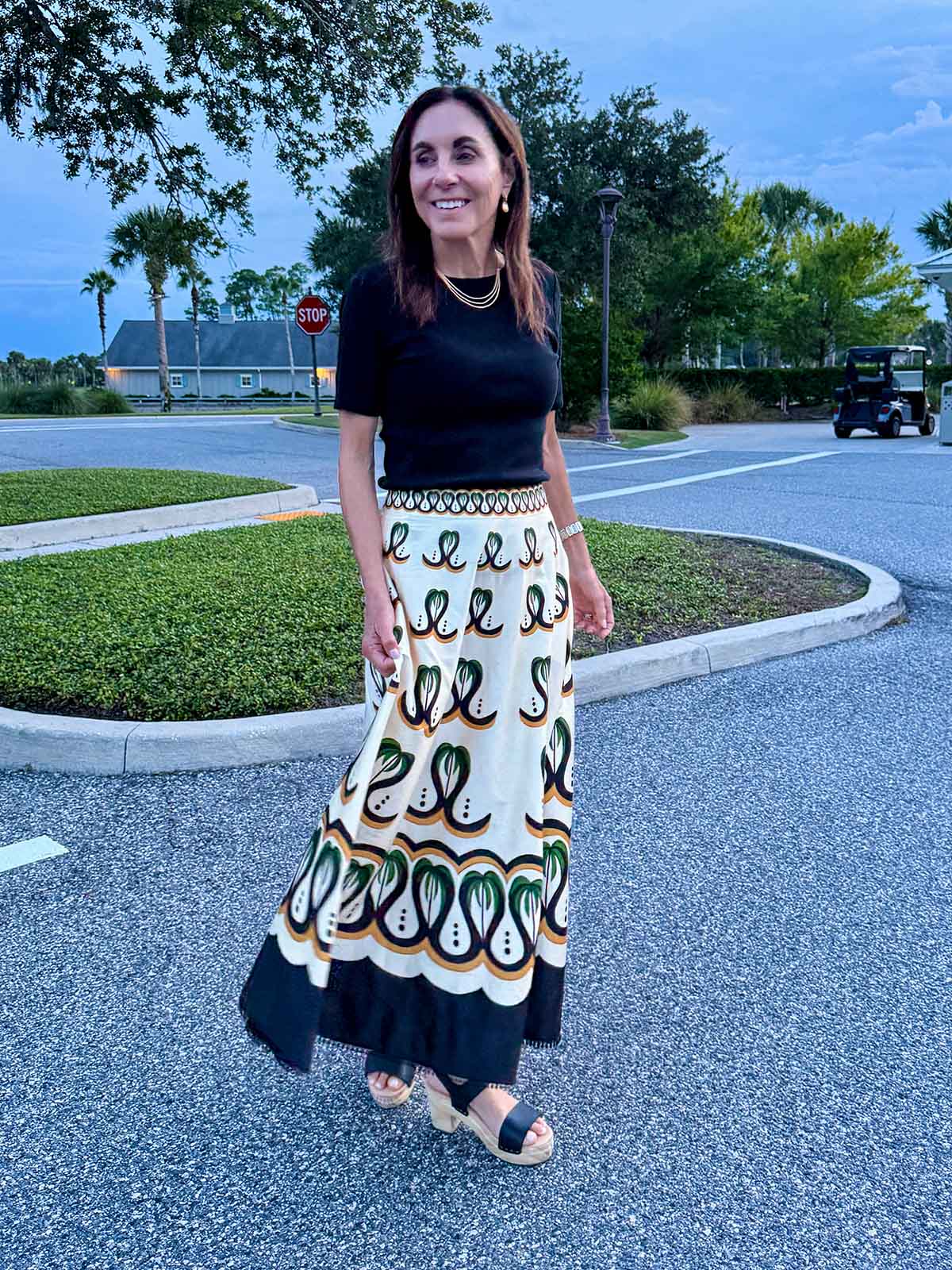 Patterned Maxi Skirt with Black Knit Top Patterned Maxi Skirt with Black Knit Top — Classy Restaurant Outfit