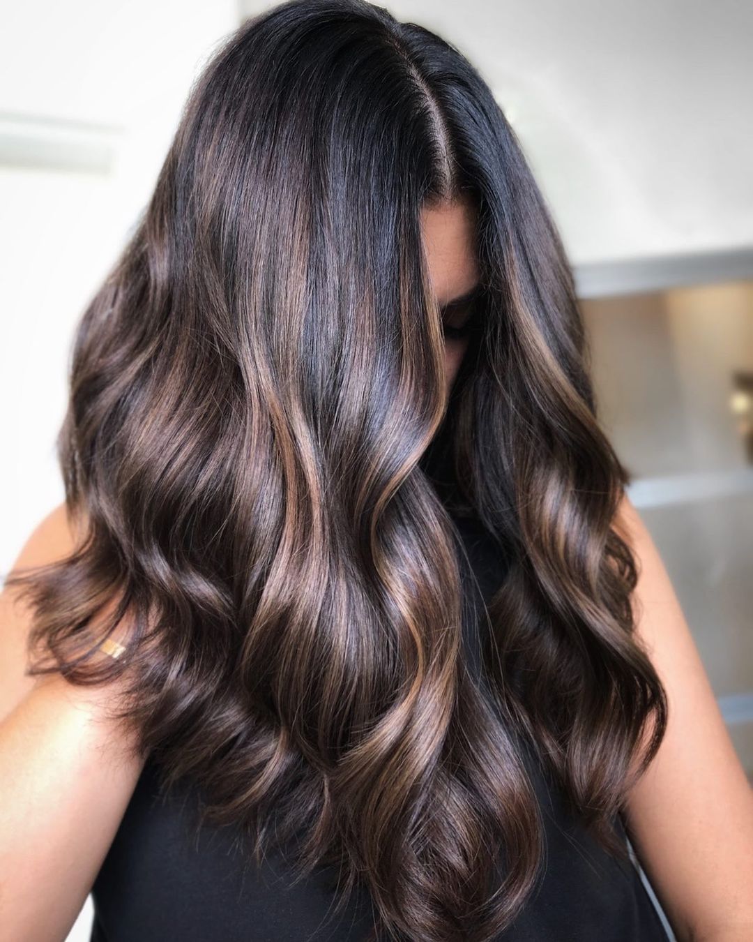 Mid-Back Wavy Blowout With Lighter Brown Highlights Mid-Back Wavy Blowout With Lighter Brown Highlights — Classy Rich Brunette