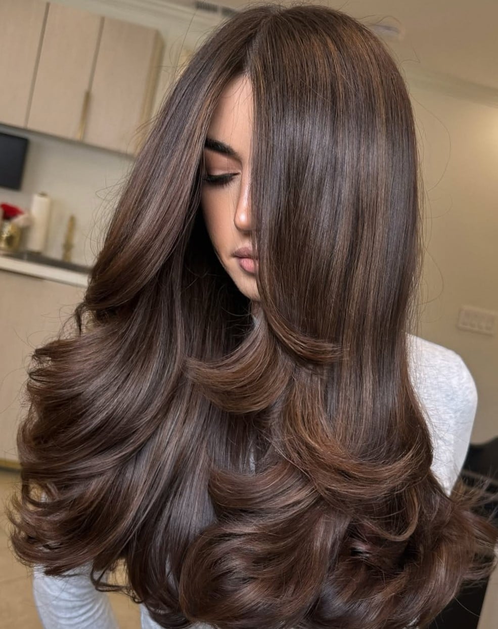 Mid-Back Voluminous Blowout With Caramel Tones Mid-Back Voluminous Blowout With Caramel Tones — Classy Rich Brunette
