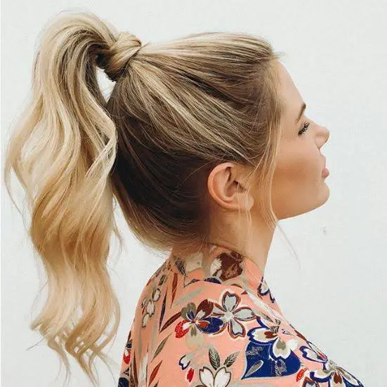 Ash Blonde Voluminous Ponytail With Wispy Bangs — Classy Running Hairstyles