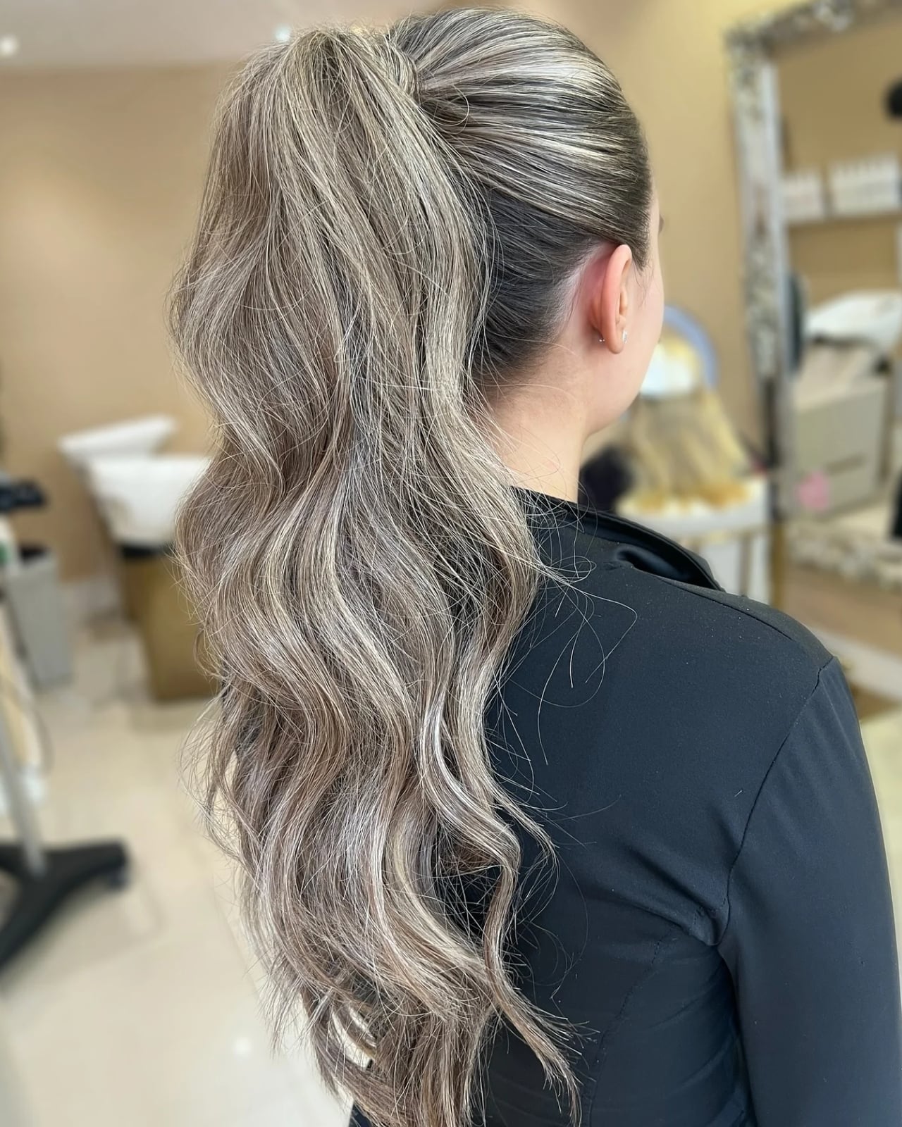 Voluminous Ash Blonde Wavy Ponytail — Classy Running Hairstyles