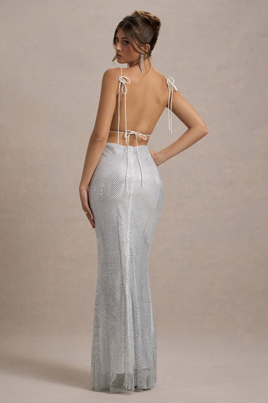 Silver Sequined Dress with Open Back and White Tie Details Silver Sequined Dress with Open Back and White Tie Details — Classy Silver Outfits