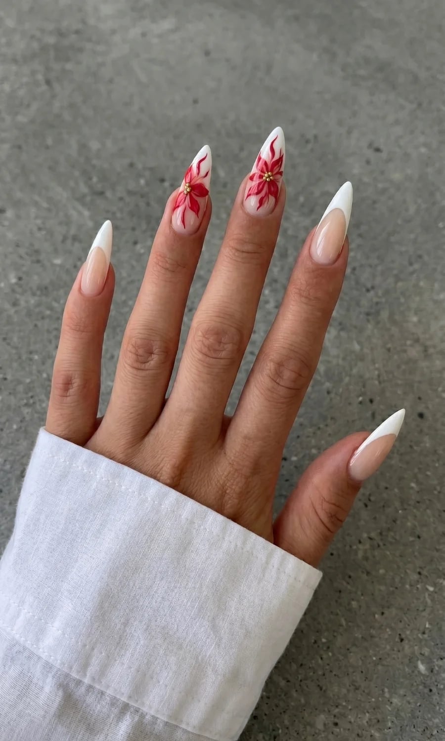 Nude Stilettos With White French Tips And Red Floral Art Nude Stilettos With White French Tips And Red Floral Art — Classy Stiletto Nails