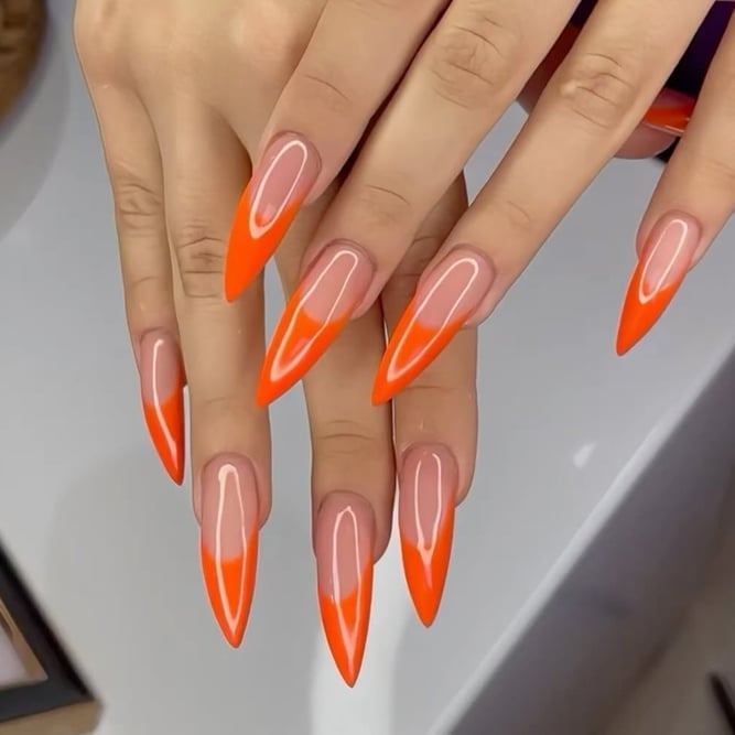 Clear Stilettos With Neon Orange French Tips Clear Stilettos With Neon Orange French Tips — Classy Stiletto Nails
