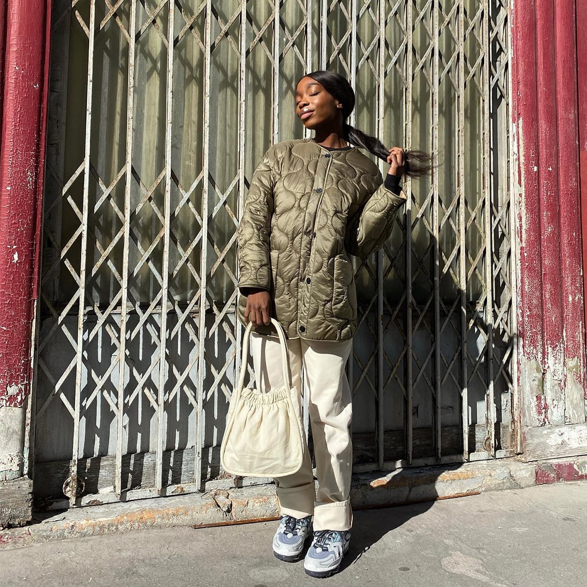 Quilted Bomber Jacket Over Black Top and Trousers Quilted Bomber Jacket Over Black Top and Trousers — Classy Streetwear Outfits