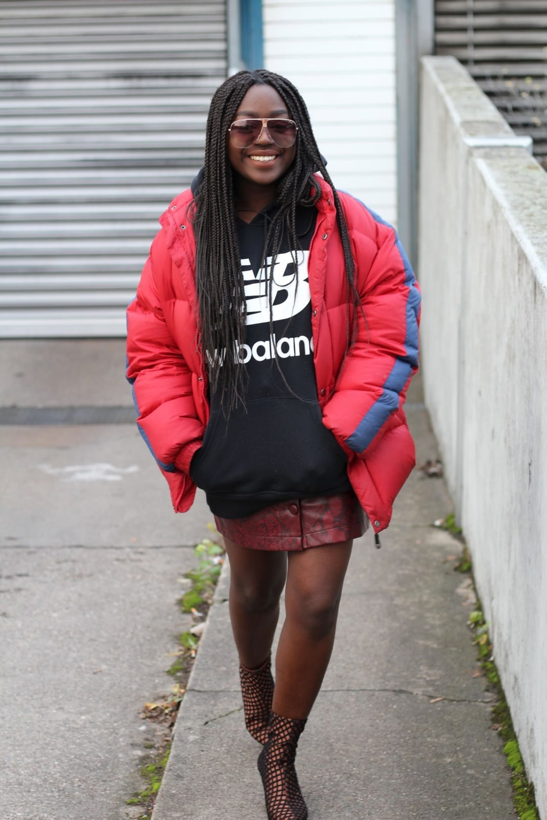 Red Puffer Jacket Over Graphic Hoodie and Mini Skirt Red Puffer Jacket Over Graphic Hoodie and Mini Skirt — Classy Streetwear Outfits