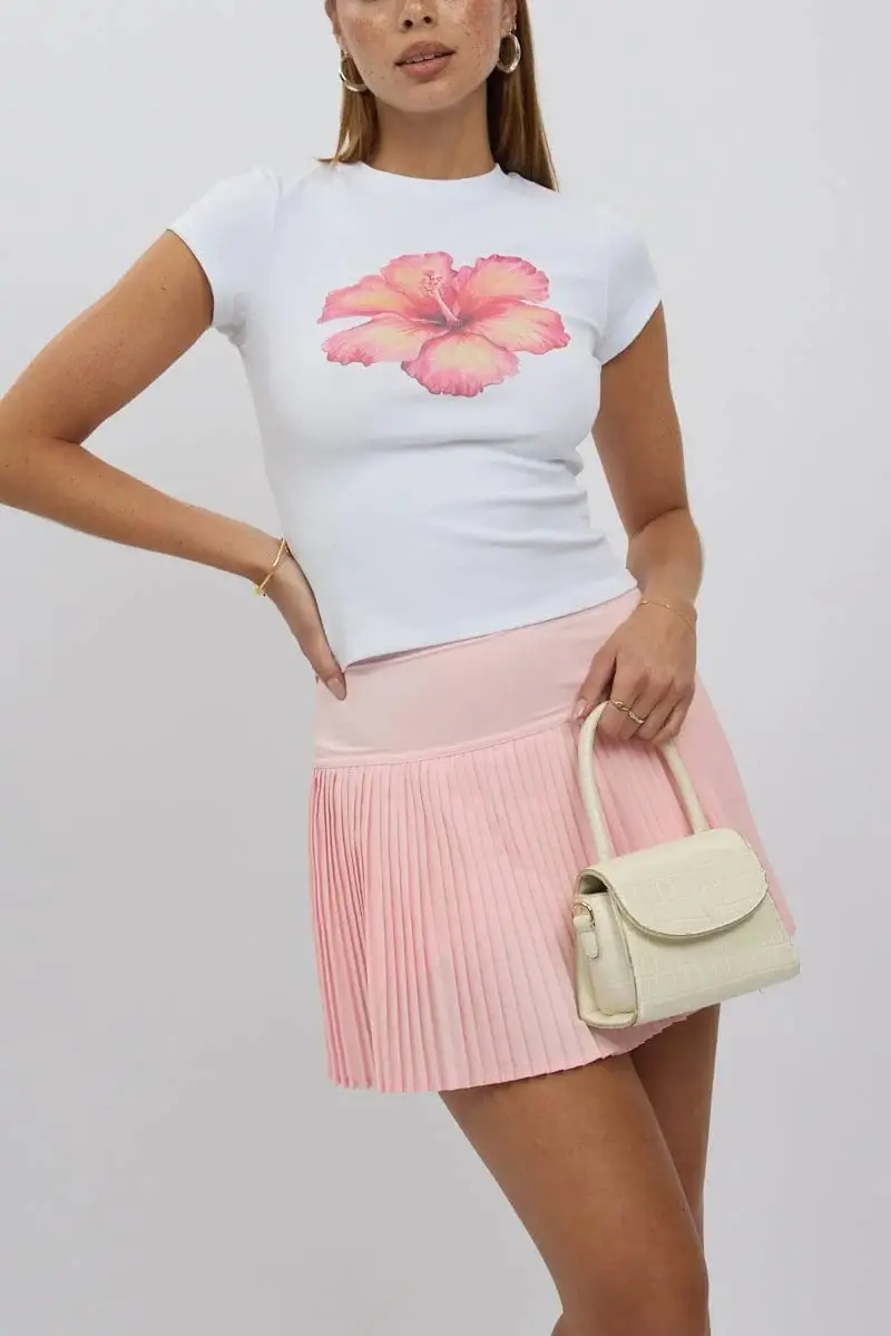 Pink Pleated Skirt with Graphic T-Shirt — Classy Tennis Skirt Outfits