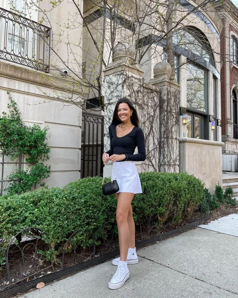 White Tennis Skirt with Black Long-Sleeve Top — Classy Tennis Skirt Outfits