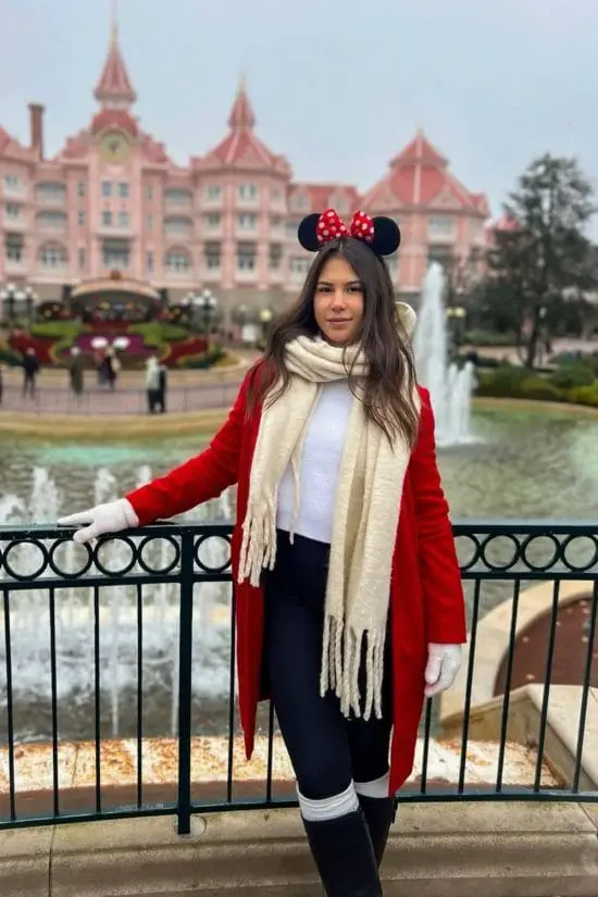 Bright Red Coat and White Scarf for Winter Theme Park Bright Red Coat and White Scarf for Winter Theme Park — Classy Theme Park Outfits