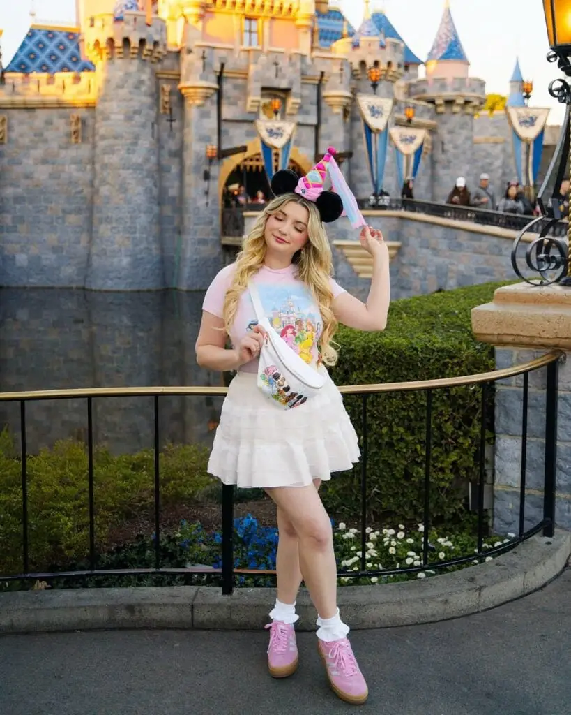 Pastel Pink Theme Park Outfit with Ruffled Mini Skirt Pastel Pink Theme Park Outfit with Ruffled Mini Skirt — Classy Theme Park Outfits