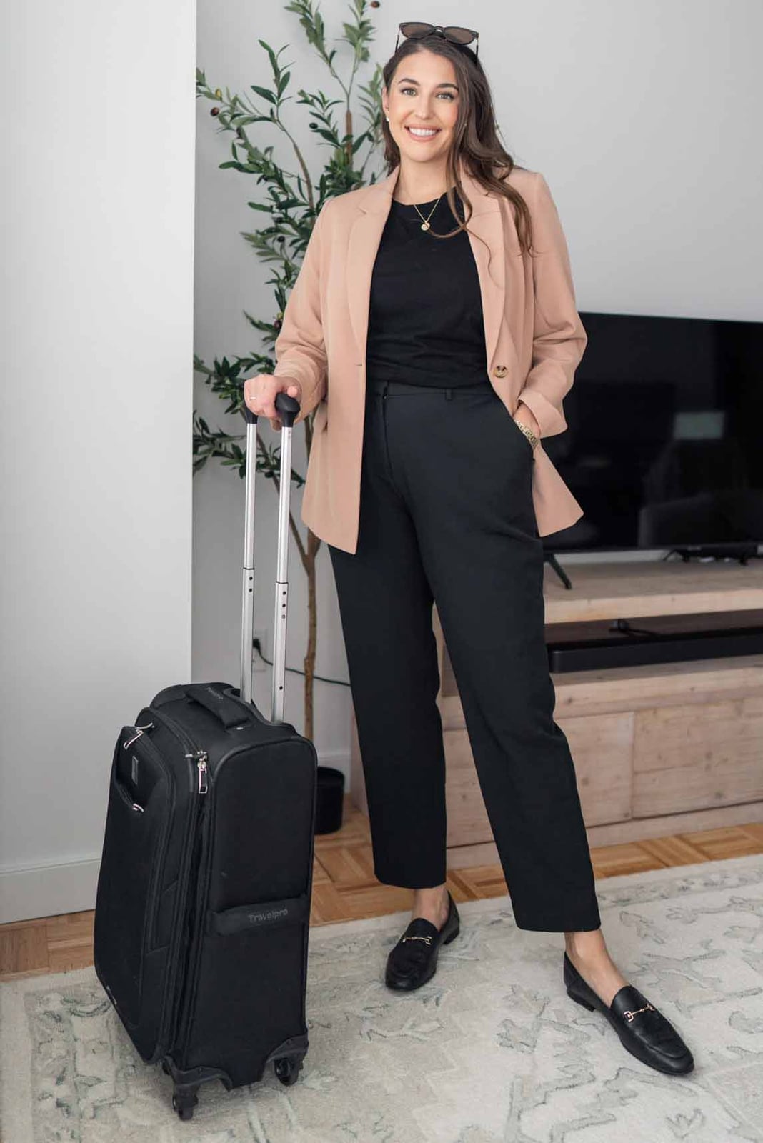Beige Blazer Over Black T-Shirt and Black Trousers — Classy Travel Outfits