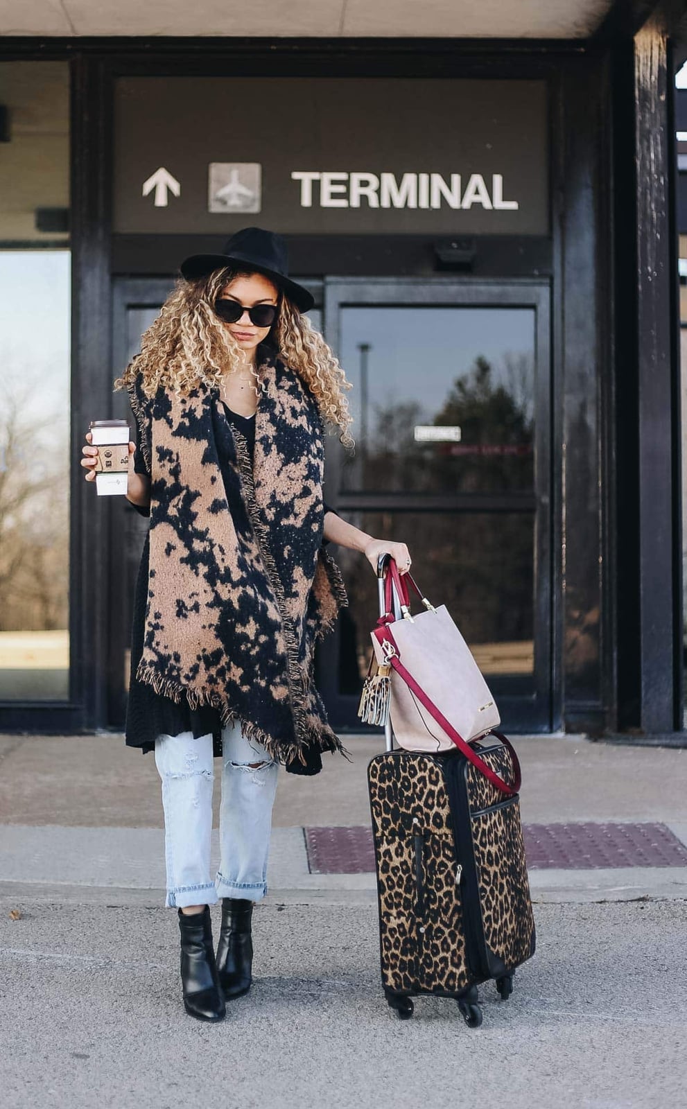 Distressed Jeans with Tunic and Animal Print Scarf — Classy Travel Outfits