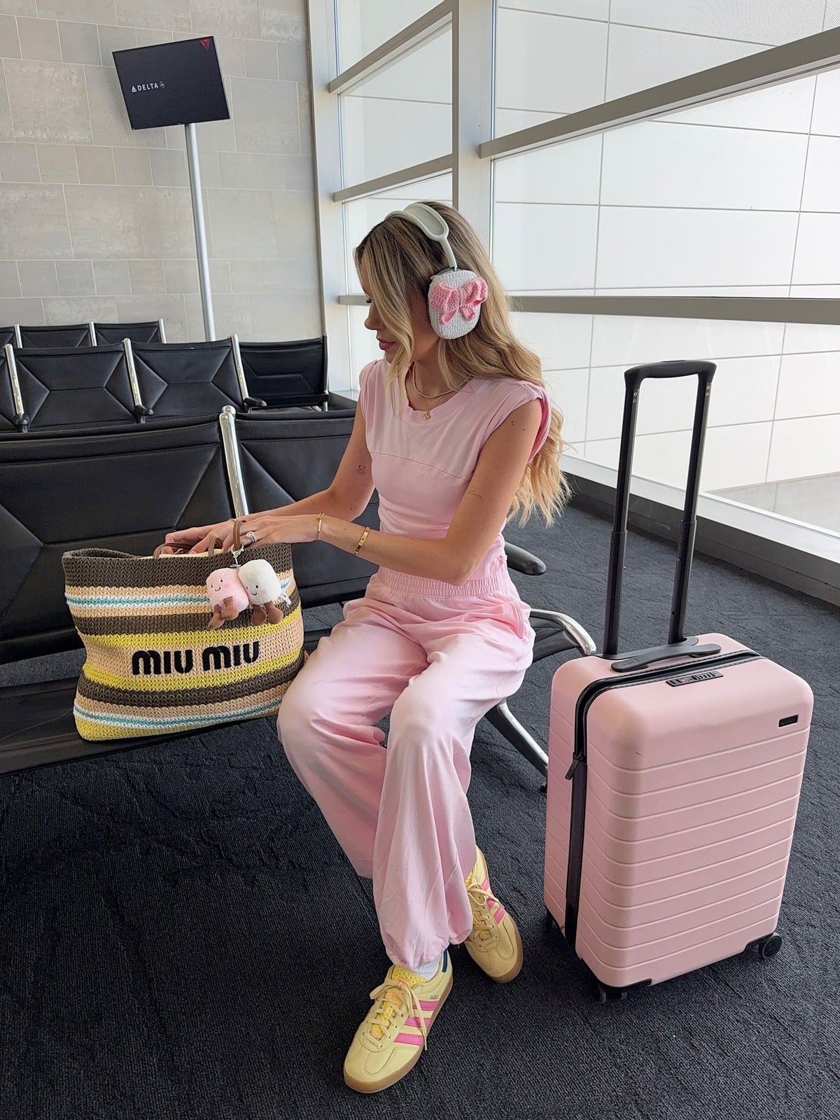 Pink Knit Set with Yellow Sneakers for Travel — Classy Travel Outfits