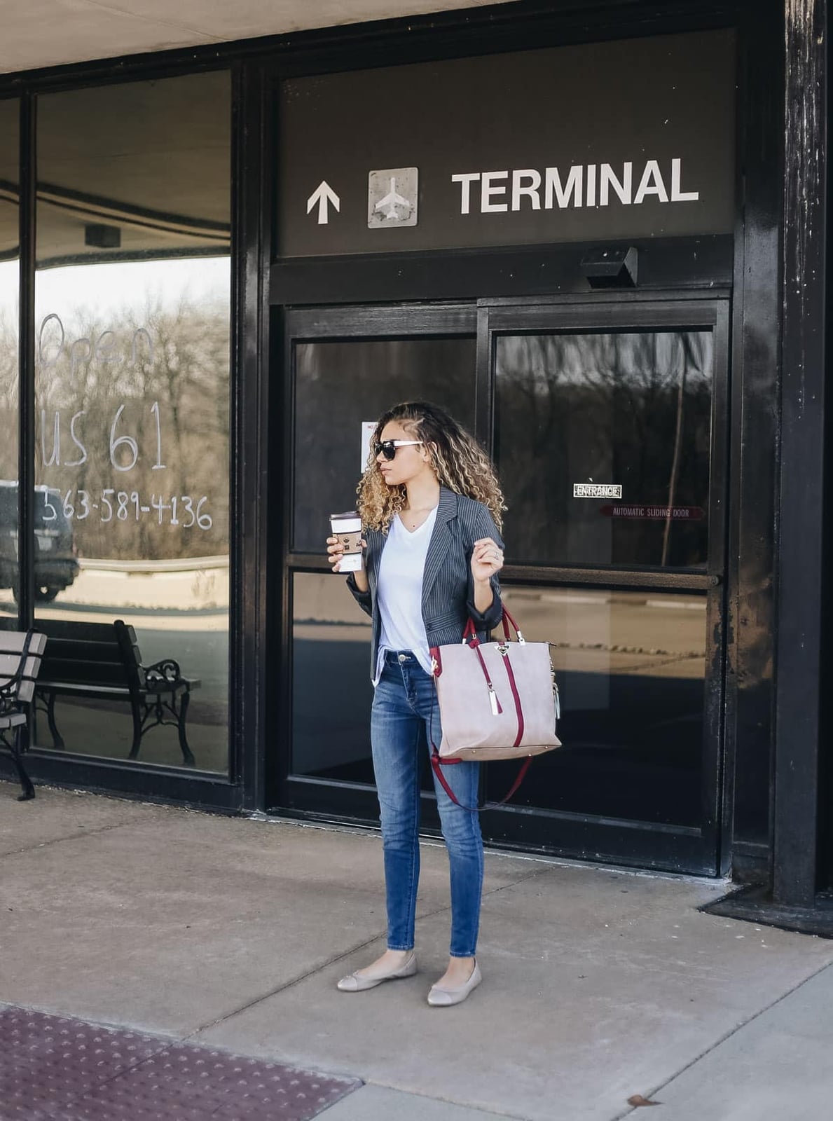 Pinstripe Blazer Over T-Shirt and Skinny Jeans — Classy Travel Outfits